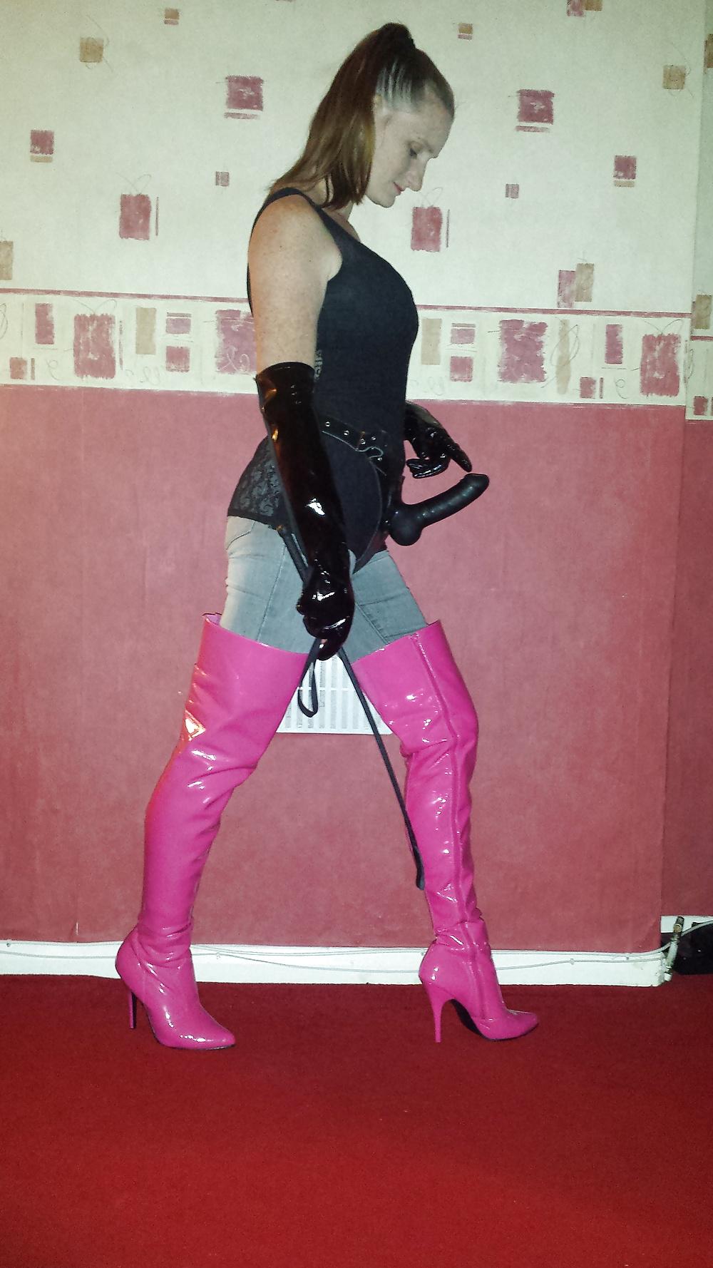 9P Strapon wearing mistress in pink thigh high boots