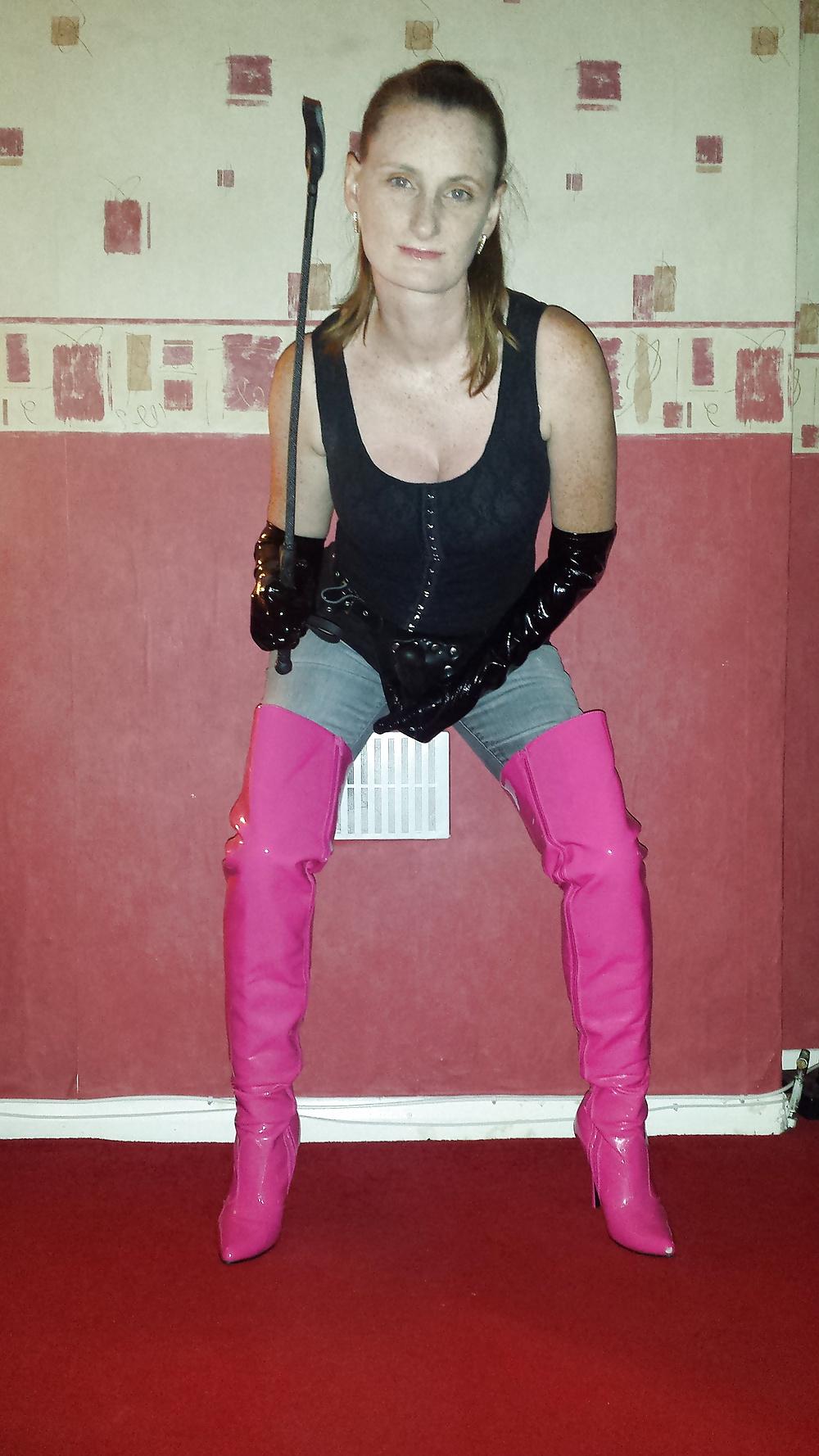9P Strapon wearing mistress in pink thigh high boots