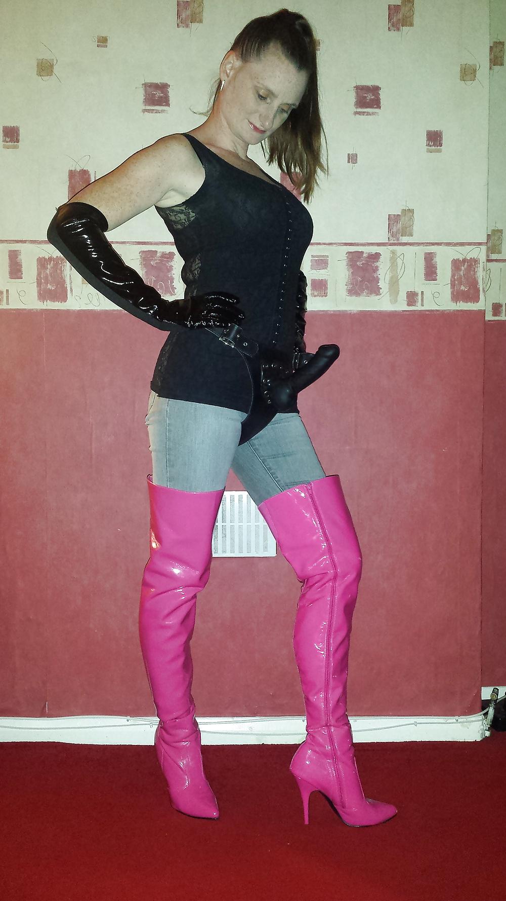 9P Strapon wearing mistress in pink thigh high boots