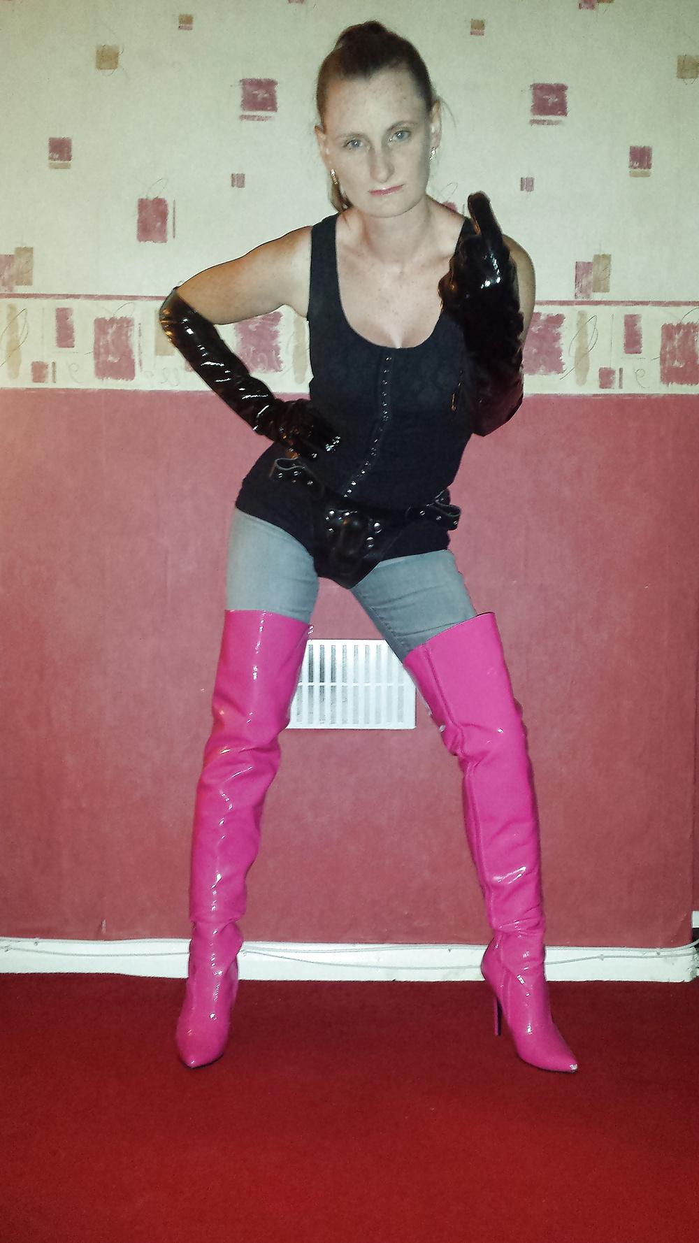 9P Strapon wearing mistress in pink thigh high boots