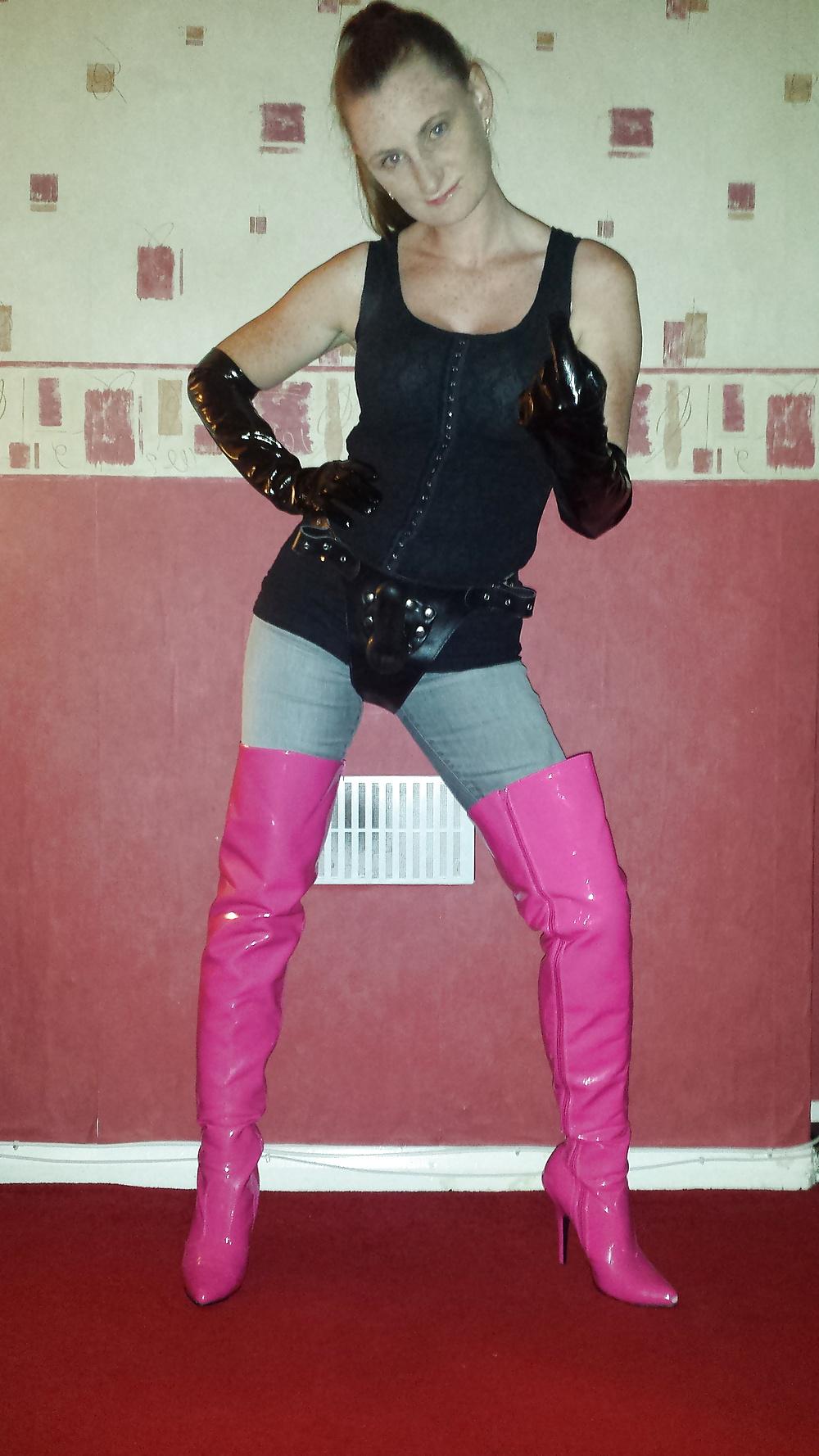 9P Strapon wearing mistress in pink thigh high boots