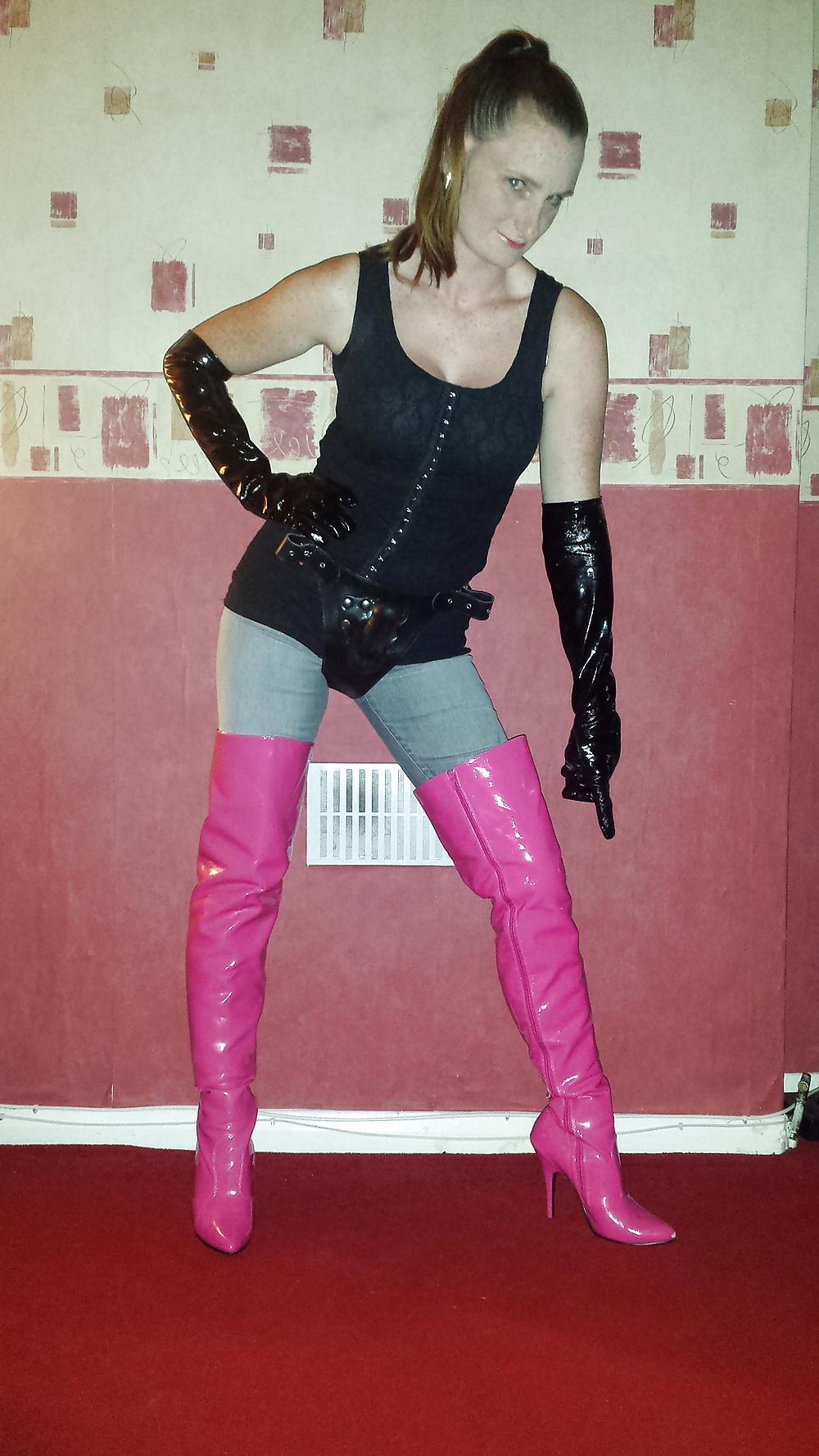 9P Strapon wearing mistress in pink thigh high boots