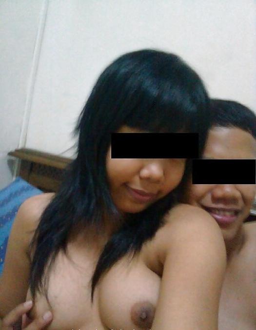 4P Young Indonesian Couple showing themselves