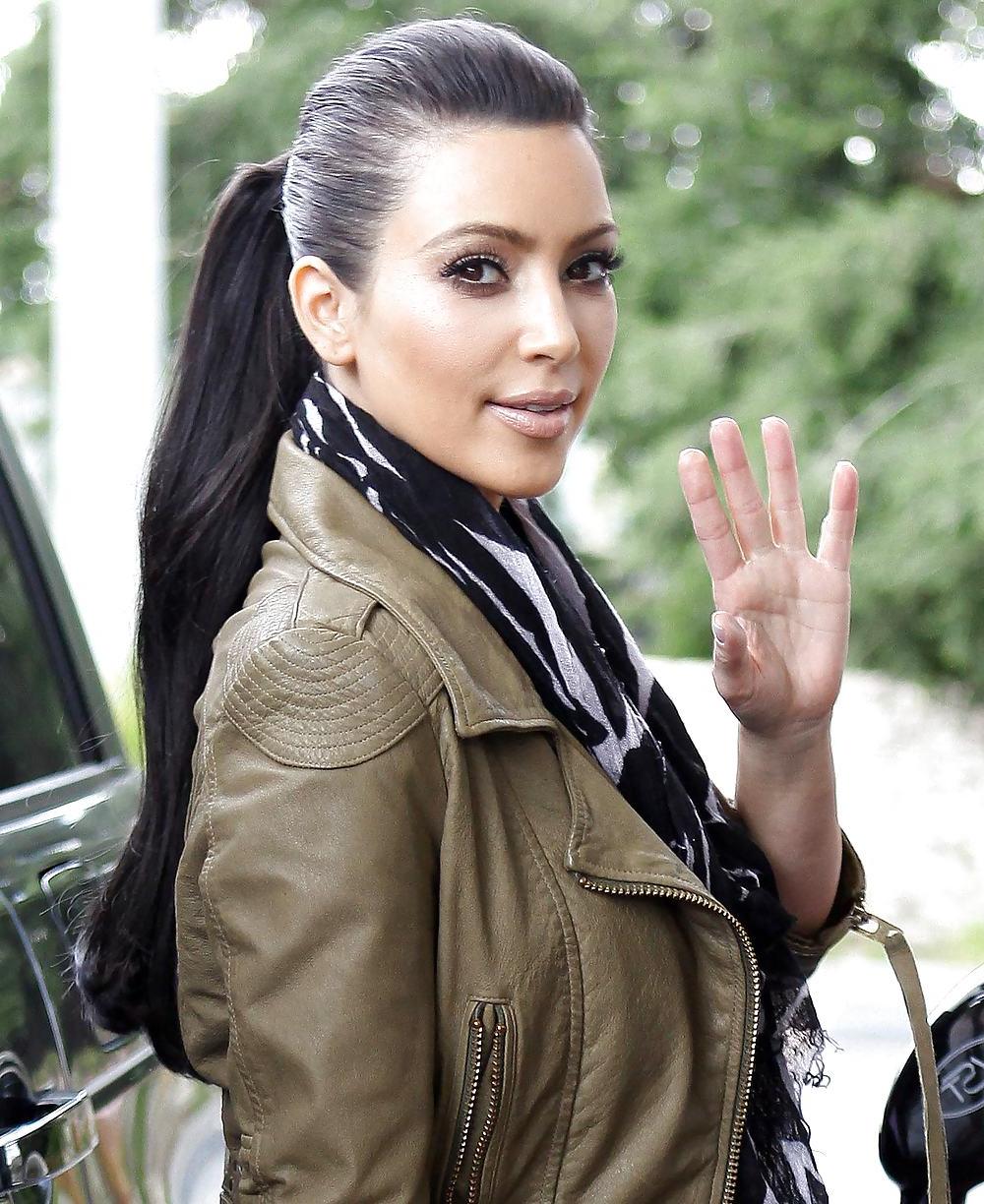 25P Kim Kardashian in big boots pumping gas in Calabasas