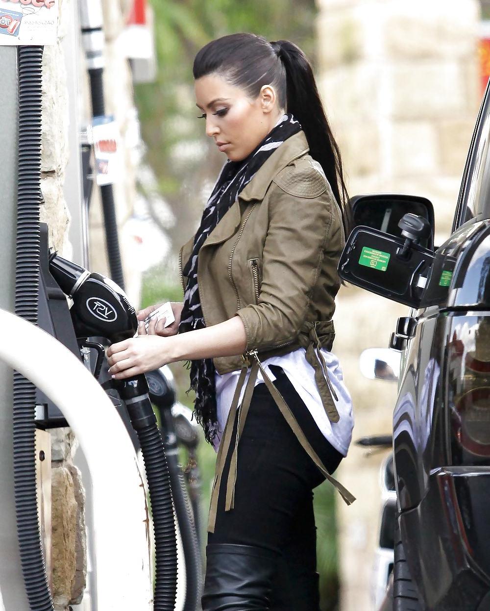25P Kim Kardashian in big boots pumping gas in Calabasas