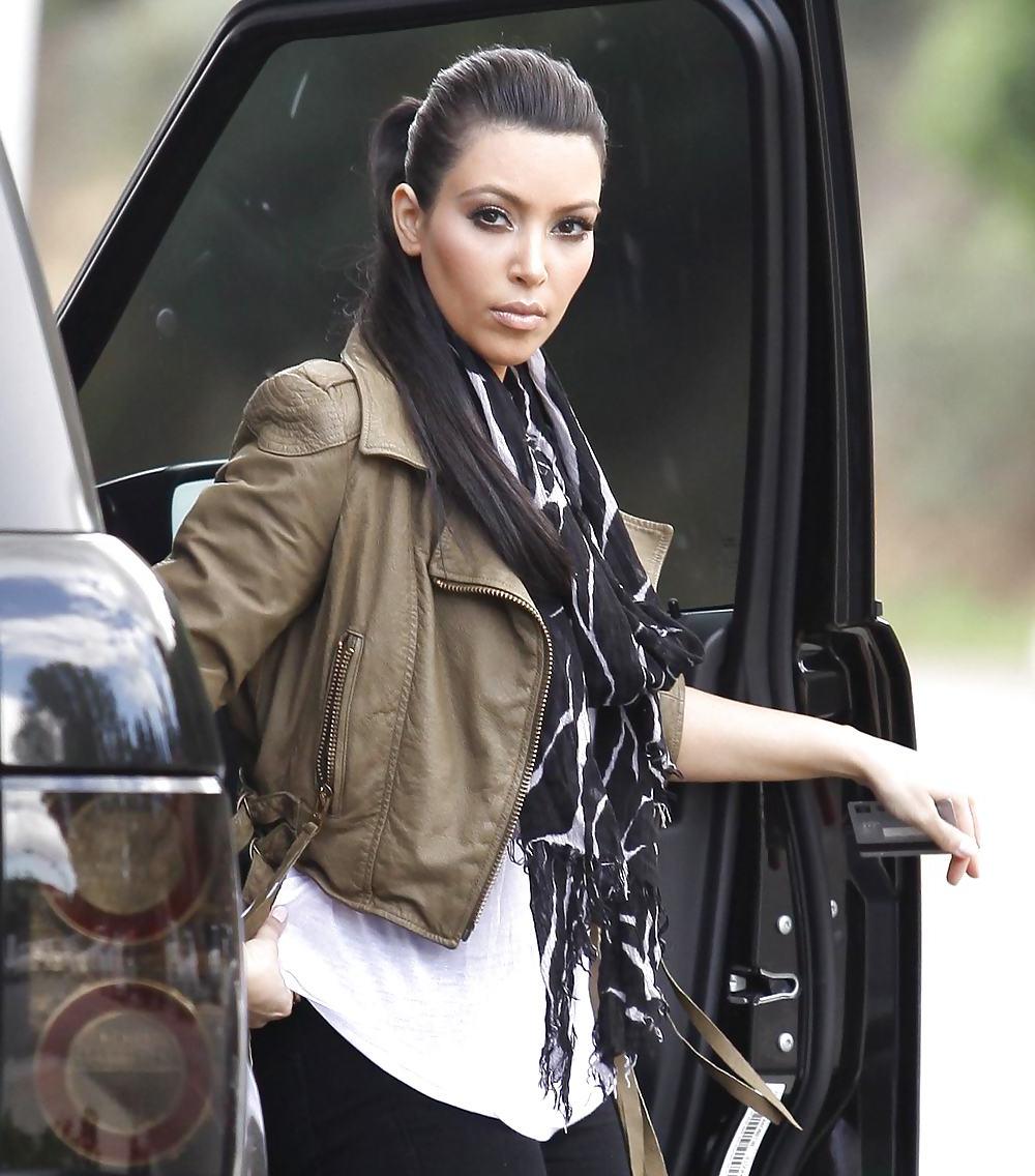 25P Kim Kardashian in big boots pumping gas in Calabasas