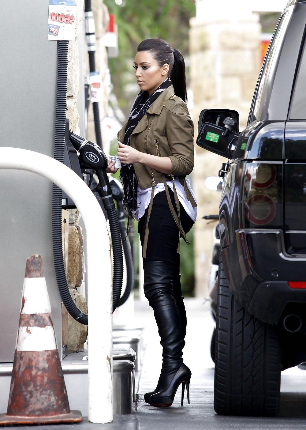 25P Kim Kardashian in big boots pumping gas in Calabasas