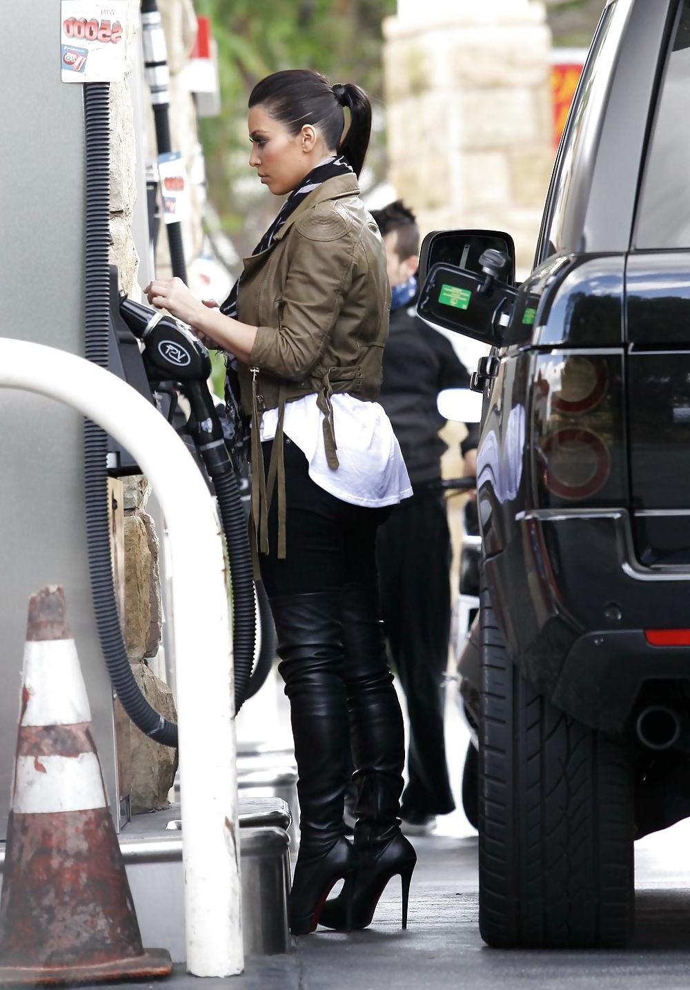 25P Kim Kardashian in big boots pumping gas in Calabasas