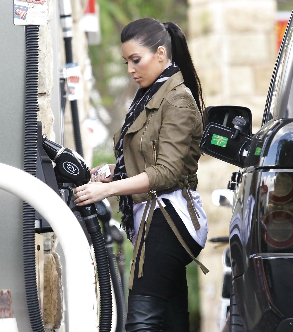 25P Kim Kardashian in big boots pumping gas in Calabasas