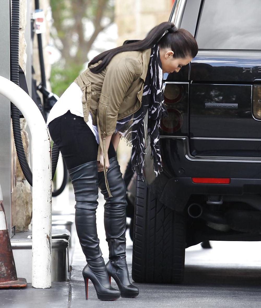 25P Kim Kardashian in big boots pumping gas in Calabasas