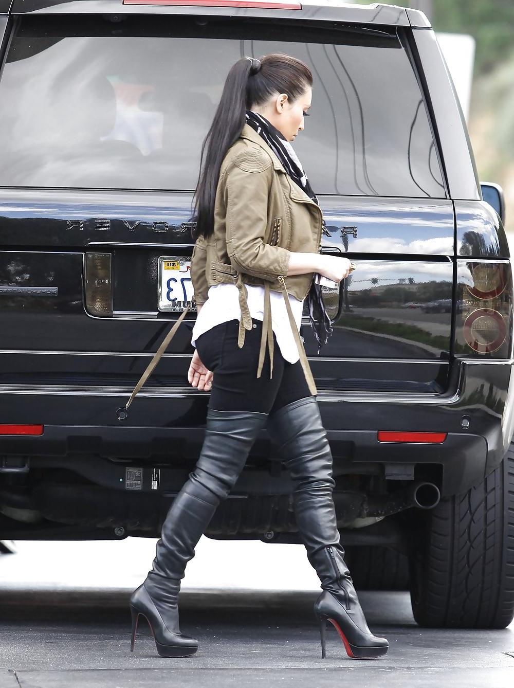 25P Kim Kardashian in big boots pumping gas in Calabasas