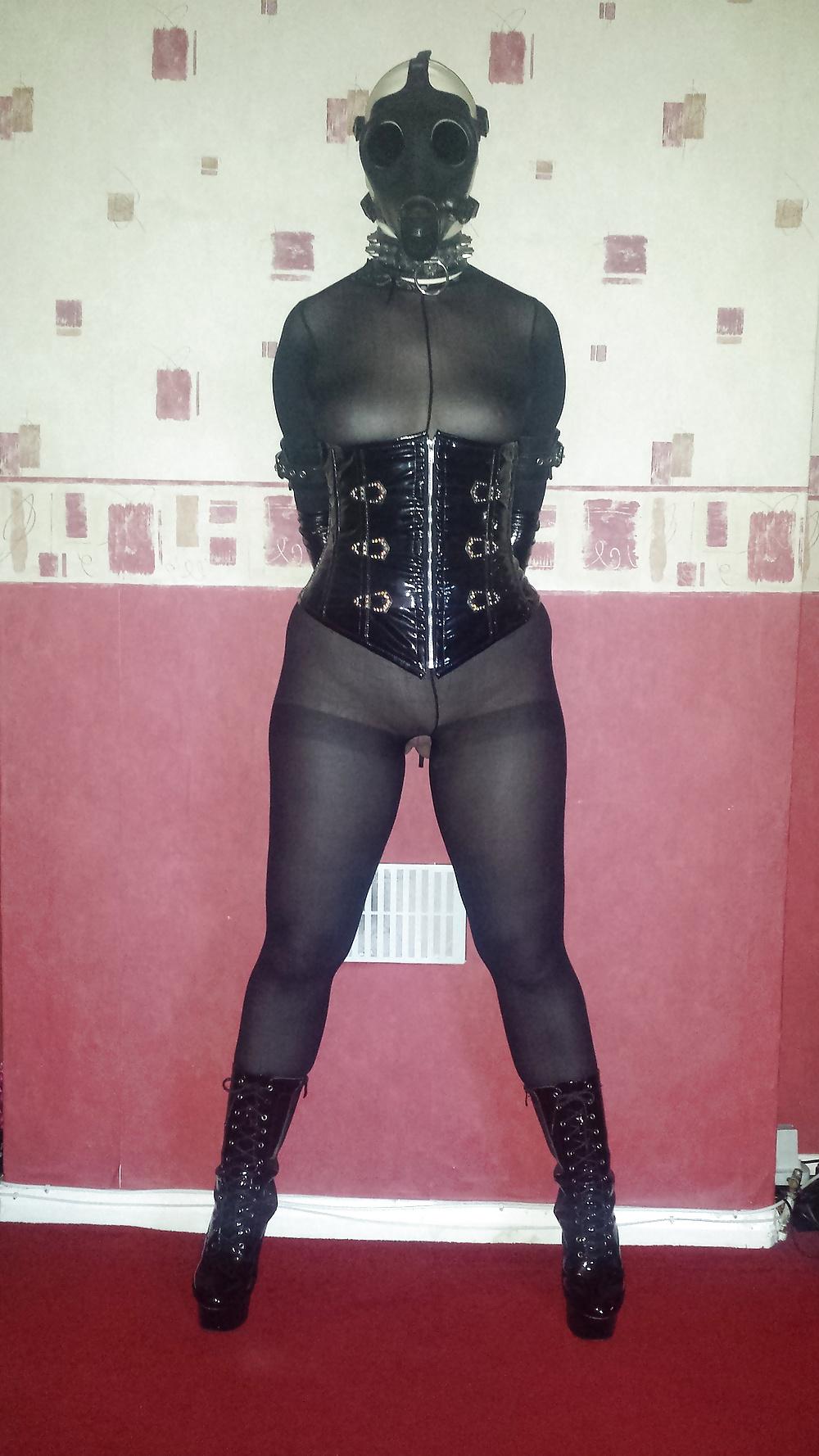 8P Slave girl wearing white rubber hood and gas mask 