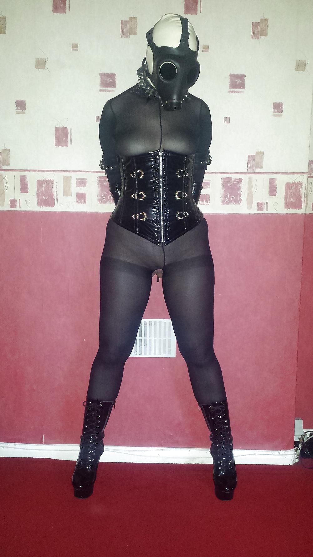 8P Slave girl wearing white rubber hood and gas mask 