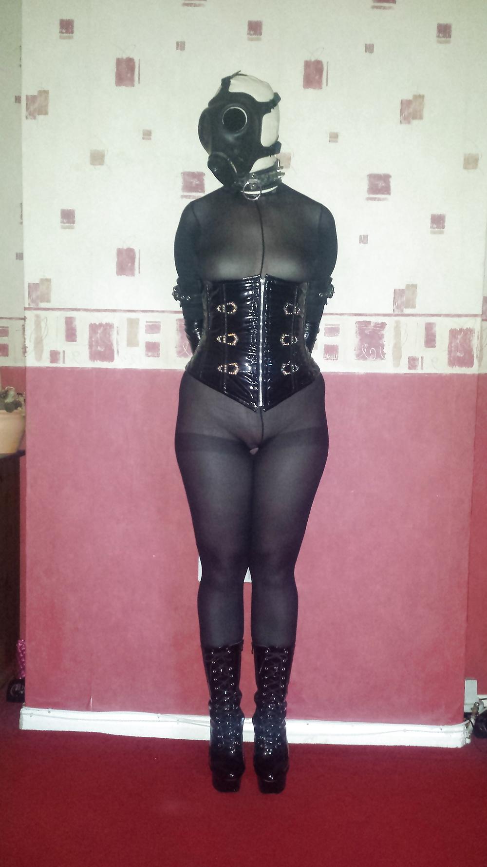 8P Slave girl wearing white rubber hood and gas mask 