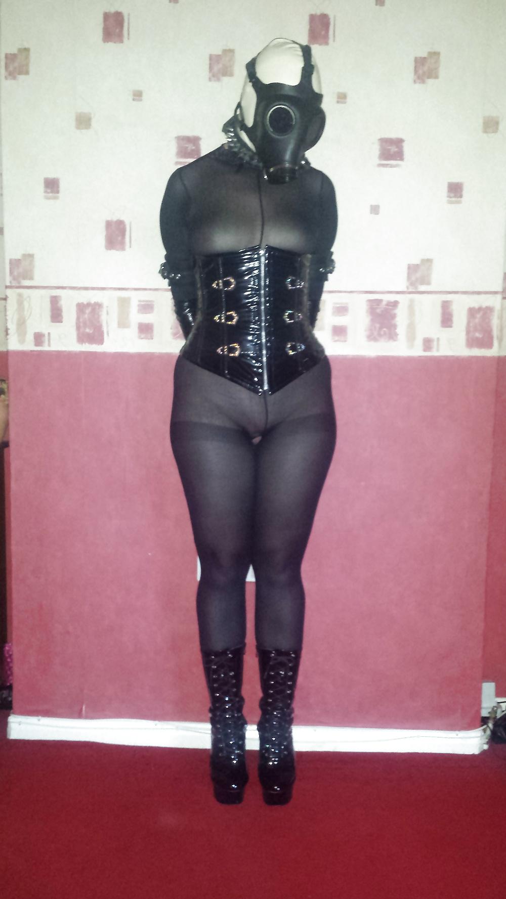 8P Slave girl wearing white rubber hood and gas mask 