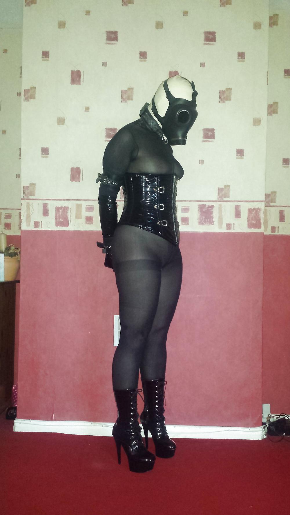 8P Slave girl wearing white rubber hood and gas mask 