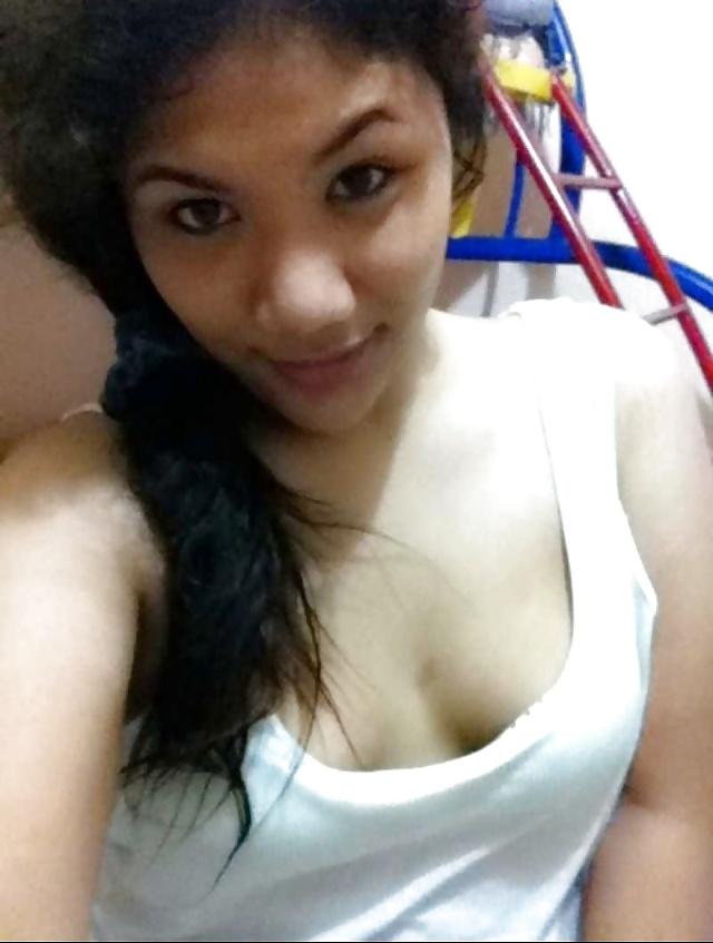 6P Petite asian shows small tits