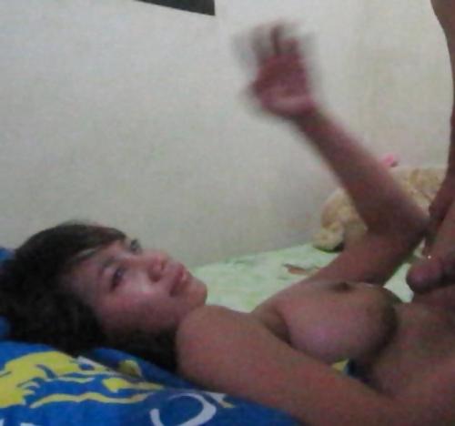 7P Fucking an Indonesian slut with saggy boobs..