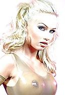 15P Blonde wearing transparent latex catsuit and latex gloves