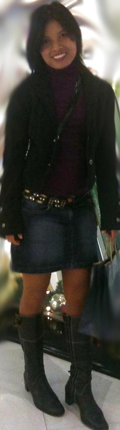 25P S. E. ASIANS  IN  GREEK  STREETS  WEARING  BOOTS
