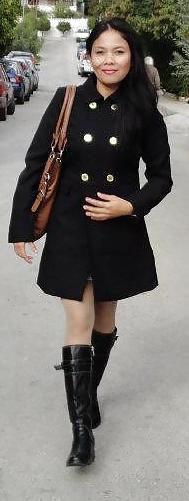 25P S. E. ASIANS  IN  GREEK  STREETS  WEARING  BOOTS