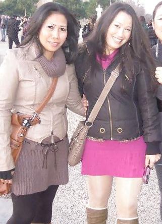 25P S. E. ASIANS  IN  GREEK  STREETS  WEARING  BOOTS