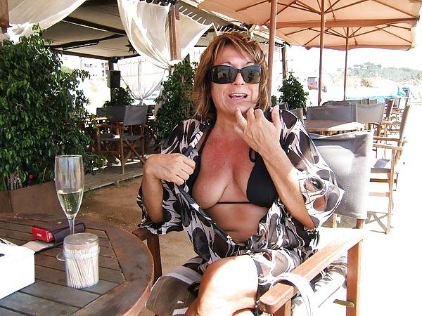 10P My sexy Spanish wife having a drink outside