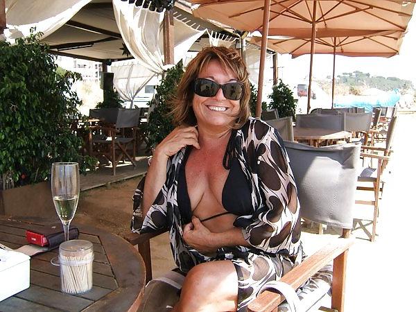 10P My sexy Spanish wife having a drink outside