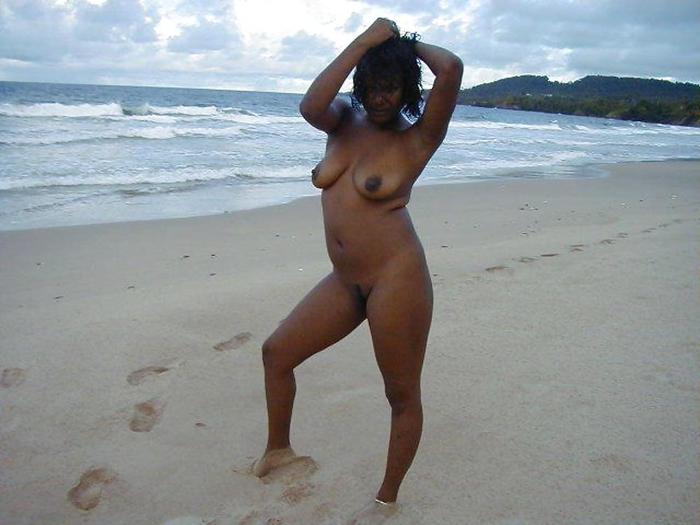 18P Ebony women on the beach