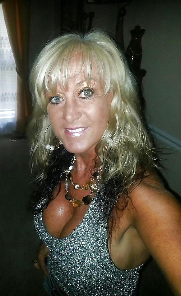 22P Big tits blonde mature