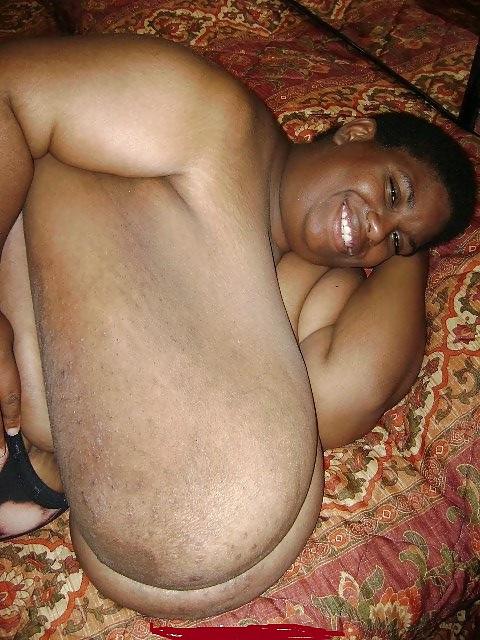 8P BLACK MATURE WOMAN SHOWS HER HUGE BOOBS