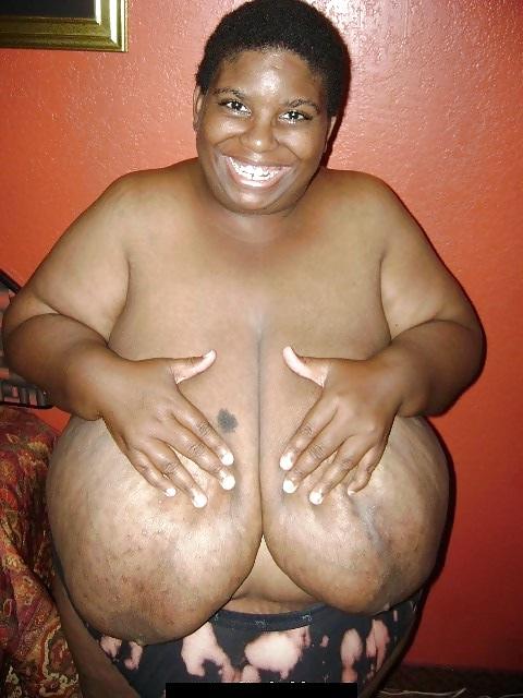 8P BLACK MATURE WOMAN SHOWS HER HUGE BOOBS