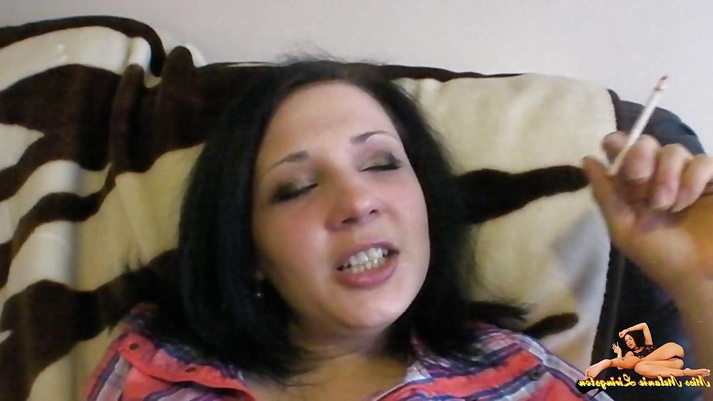 25P Smoking in black stockings