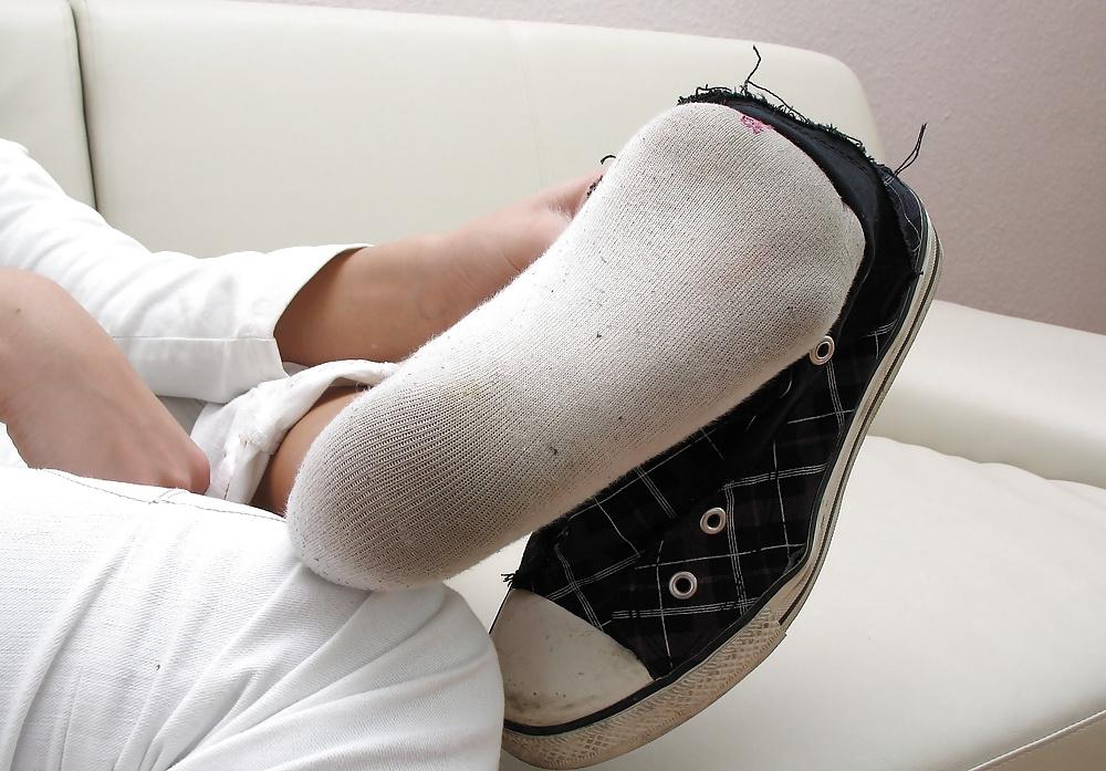 18P Girl shows her worn socks