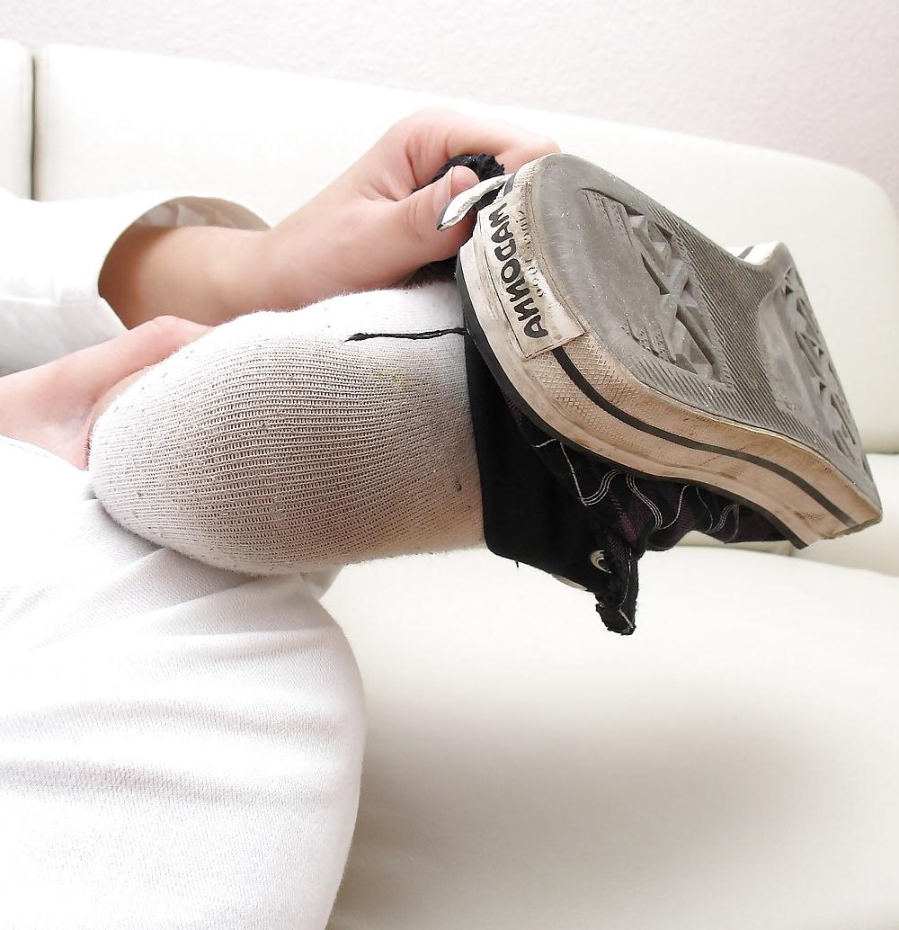 18P Girl shows her worn socks