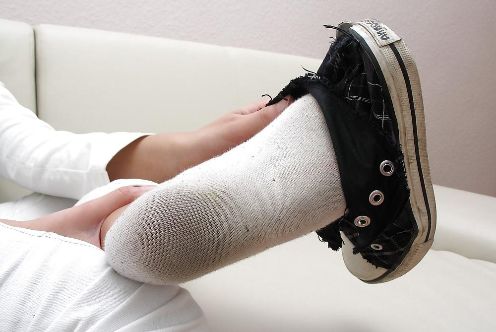 18P Girl shows her worn socks
