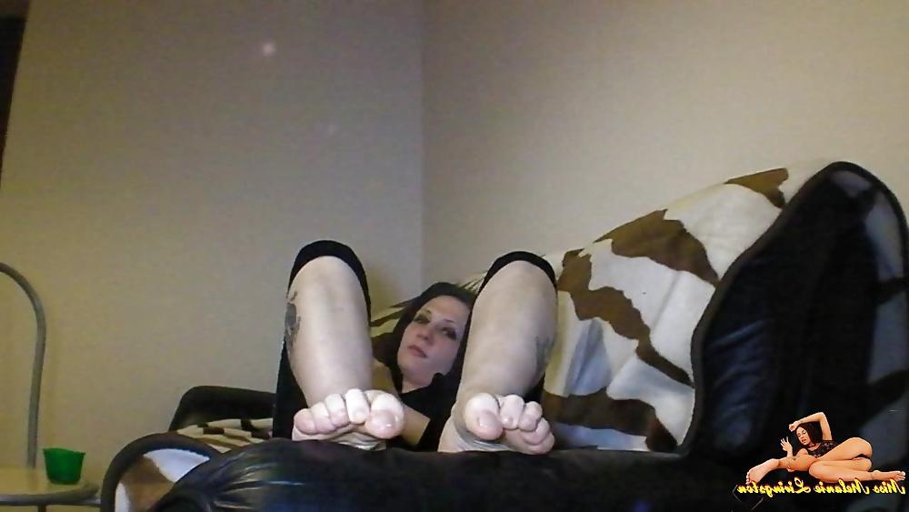 23P Barefeet smoking on sofa