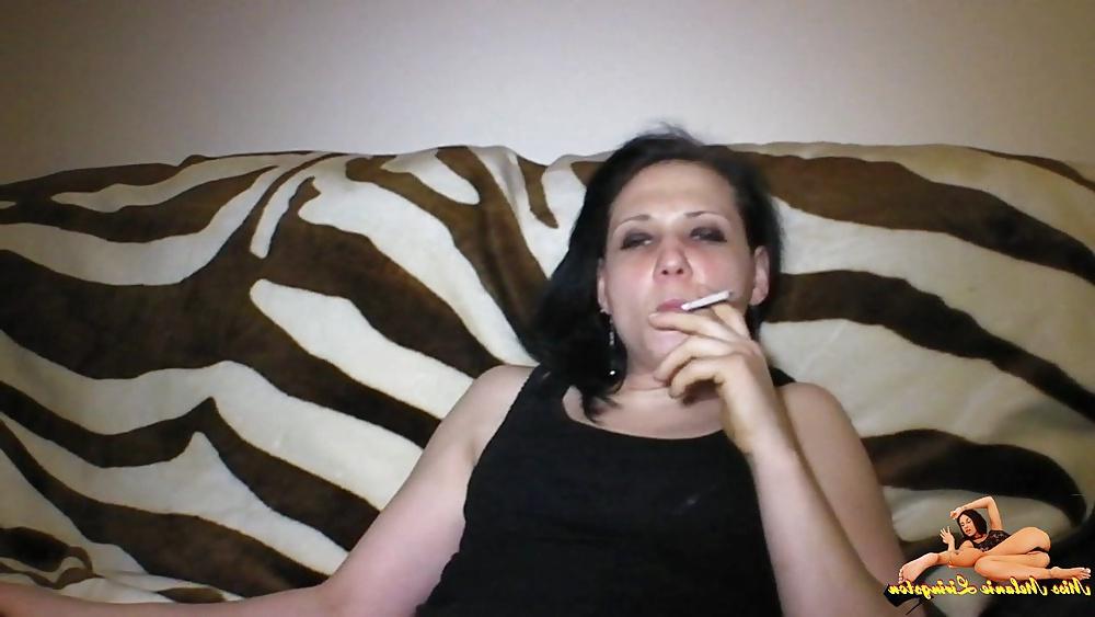23P Barefeet smoking on sofa