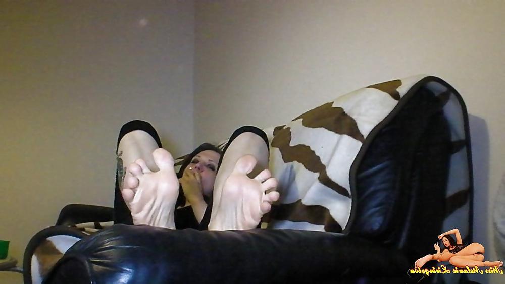 23P Barefeet smoking on sofa