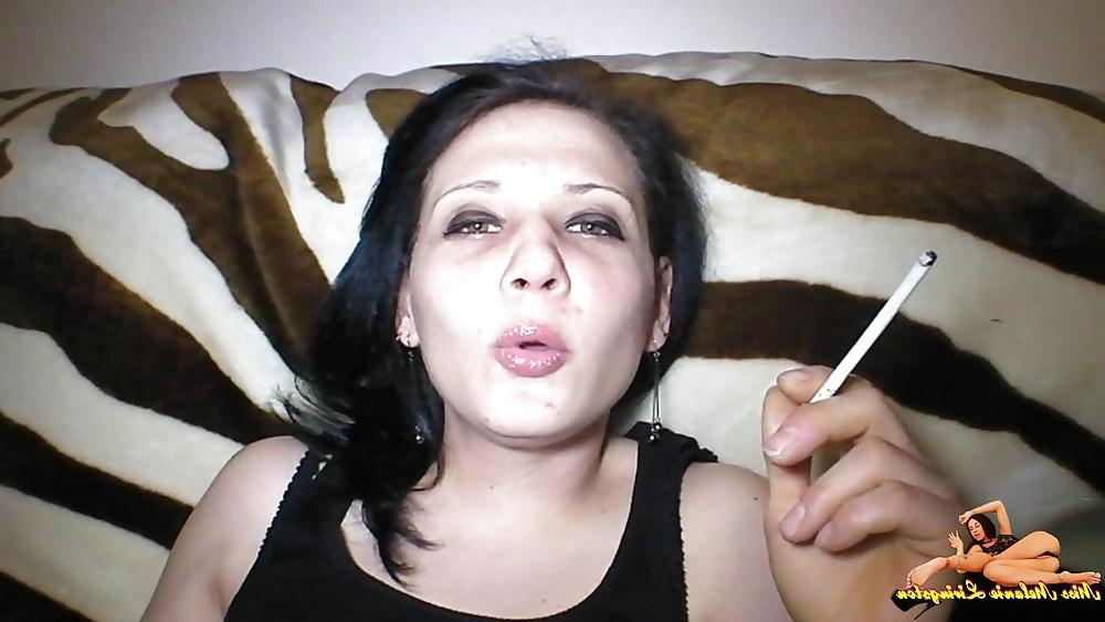 23P Barefeet smoking on sofa