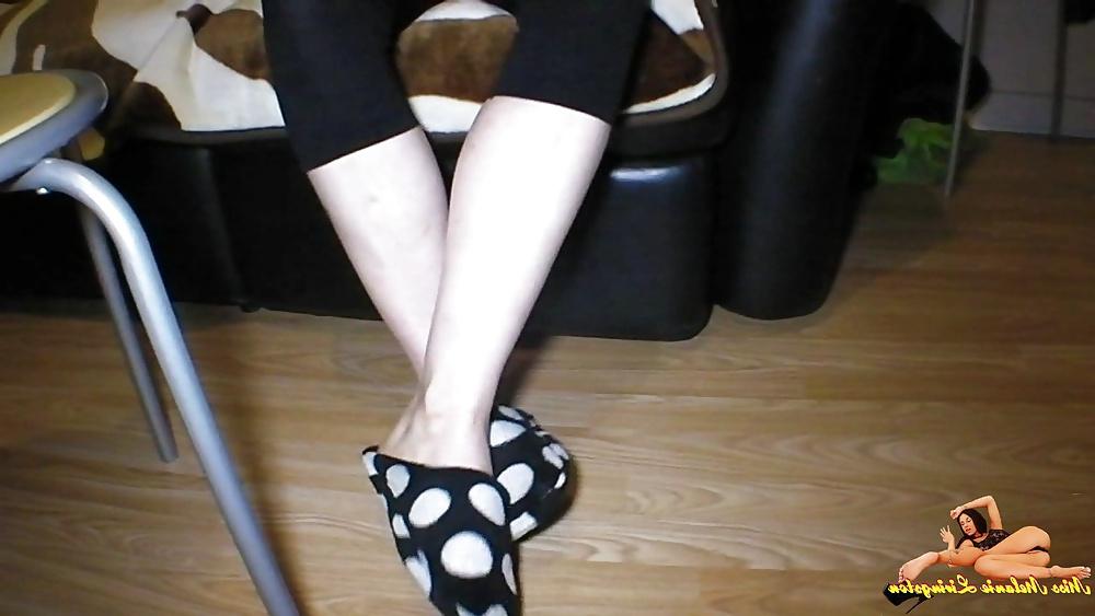 23P Barefeet smoking on sofa