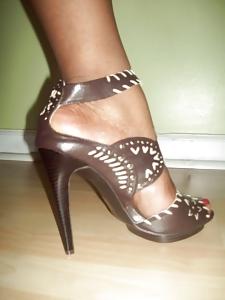 8P A girl and her shoes.