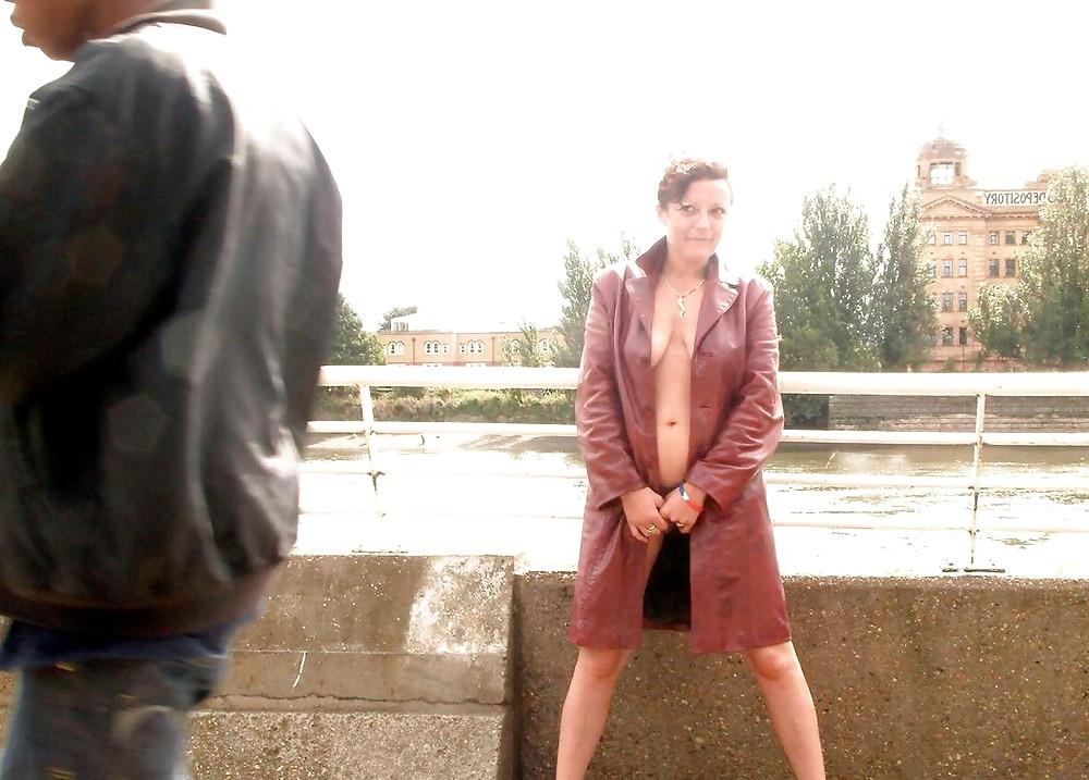 25P Crazy redhair mature flashing slutwife Isabel