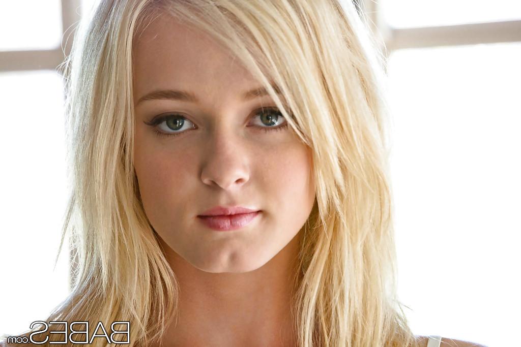 16P Perky blondie taking off her undies and showcasing her goods