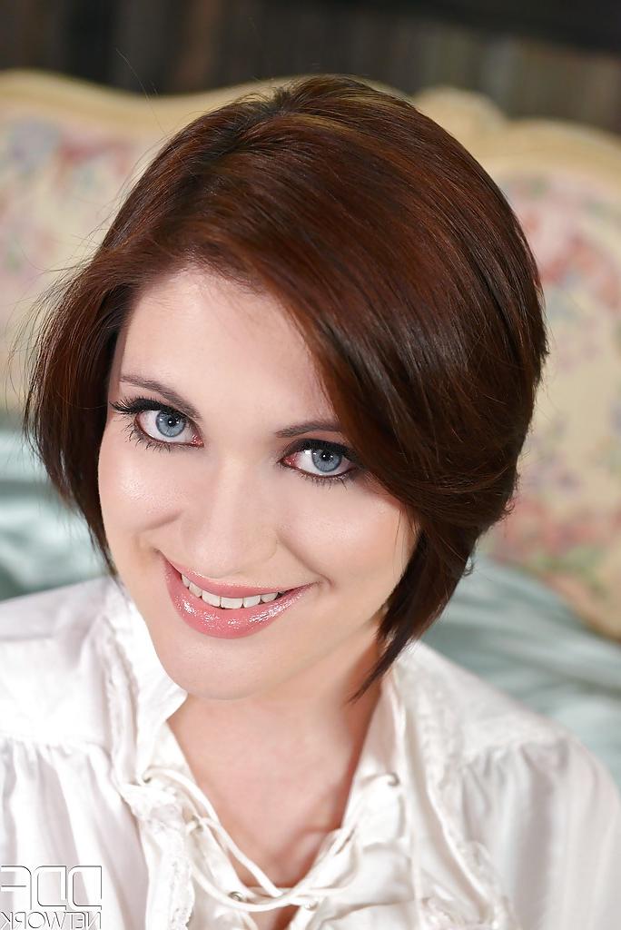 16P Redhead Euro model Brook Scott removing long black boots and riding pants