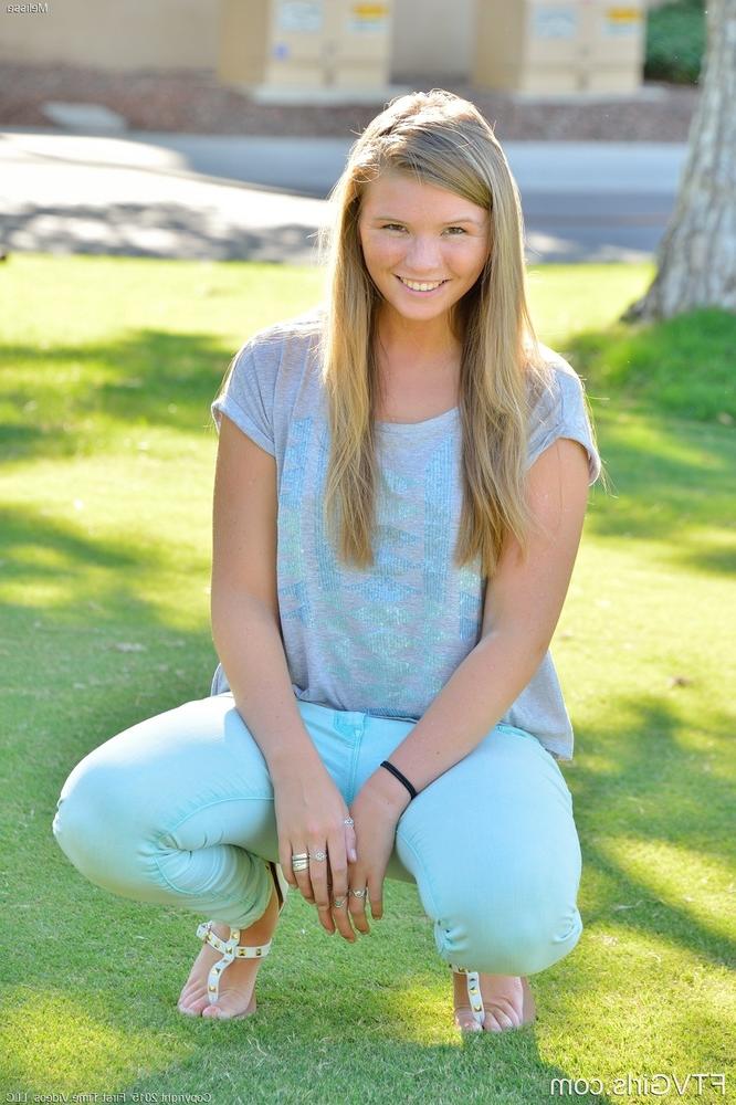 15P Fully clothed sweetie pulls down jeans on lawn before masturbating inside