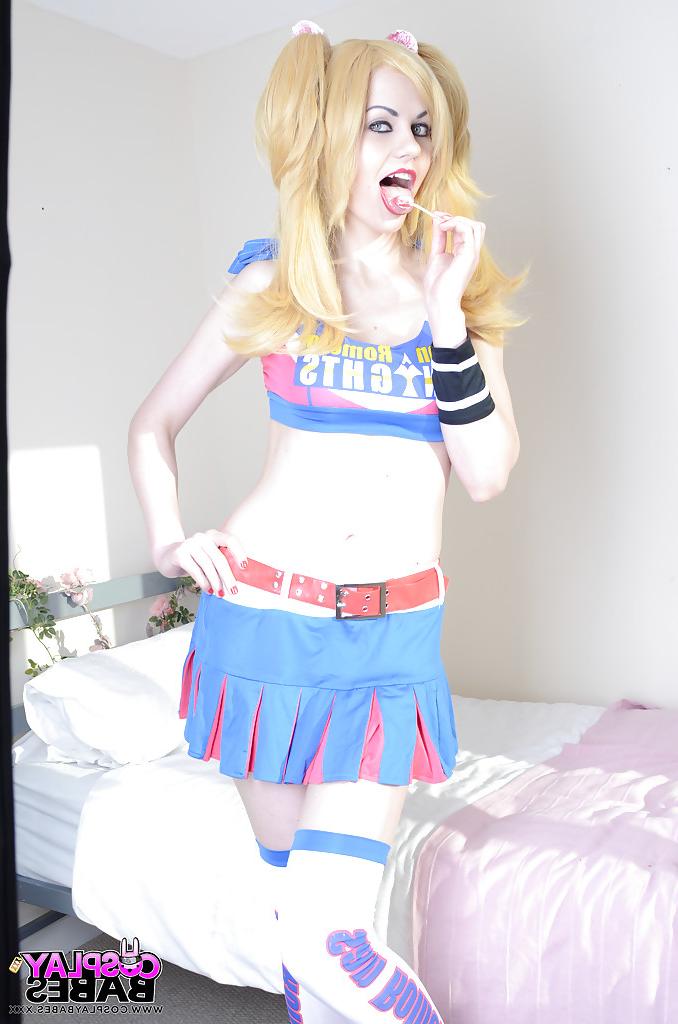 16P Blonde cosplay cutie Tina Fay masturbating shaved vagina with lollipop