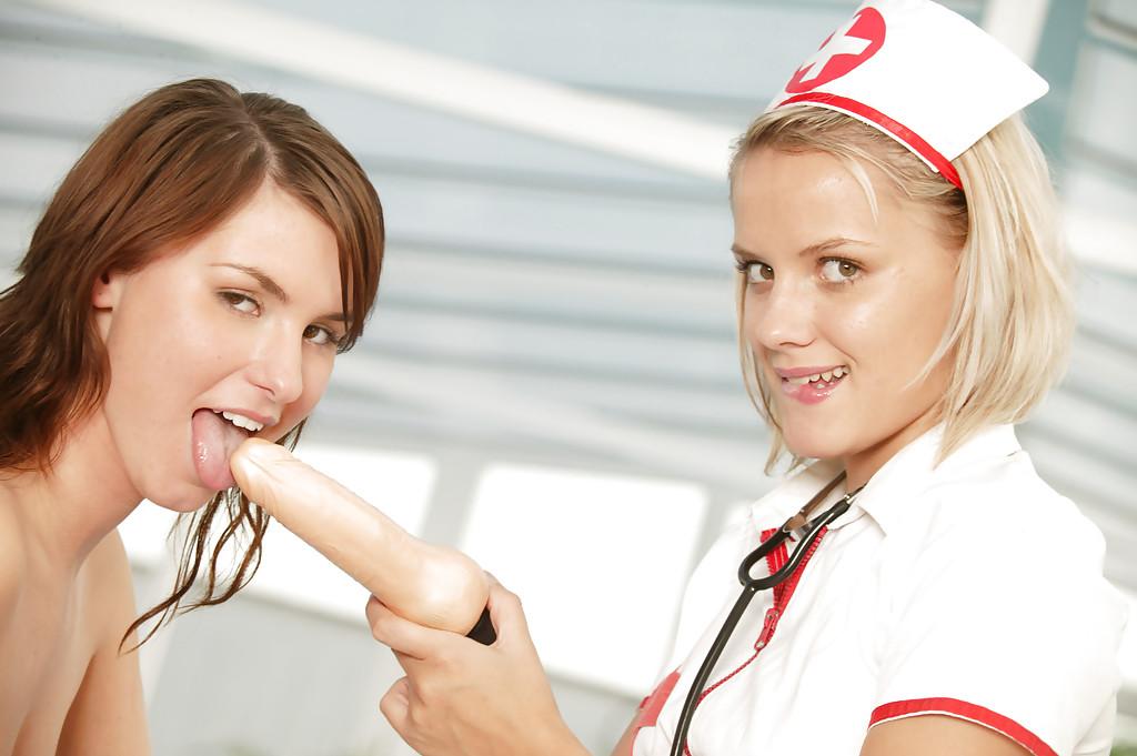 16P Lusty teen in nurse cosplay outfit has some lesbian fun with her frisky friend