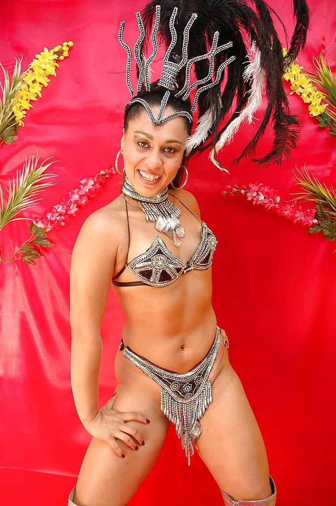 16P Playful latina taking off her carnival outfit and exposing her fuckable body