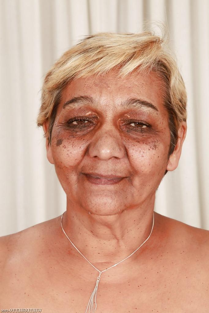 16P Fatty granny with big flabby boobs stripping off her suit and lingerie